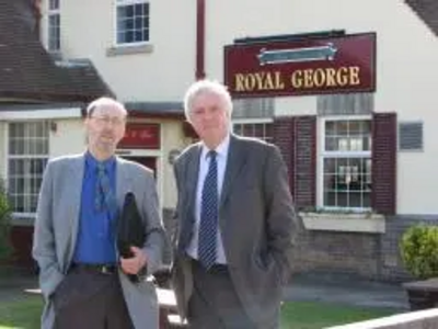 Councillors David Down and John Shipley outside the Royal George pub in Parklands Ward