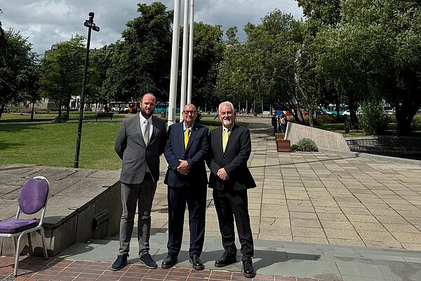 Fawdon and West Gosforth councillors Rob Austin, John Hall and Peter Lovatt stood in front of flag poles at Civic Centre