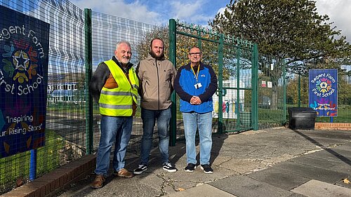 Peter, Rob and John Standing outside of school