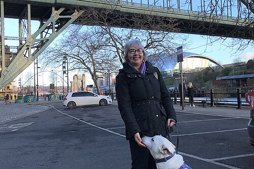 Pauline inspects the Tyne Bridge with her dog Marley