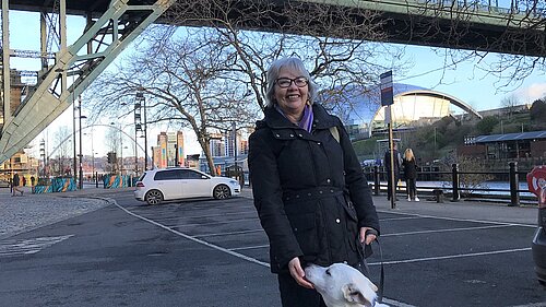Pauline inspects the Tyne Bridge with her dog Marley