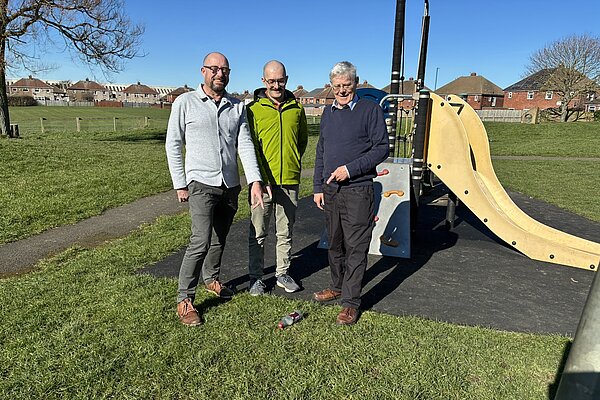 Focus team with litter in play area