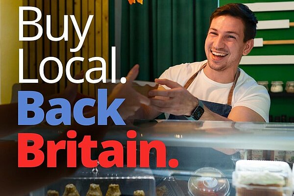 Shopkeeper selling British products