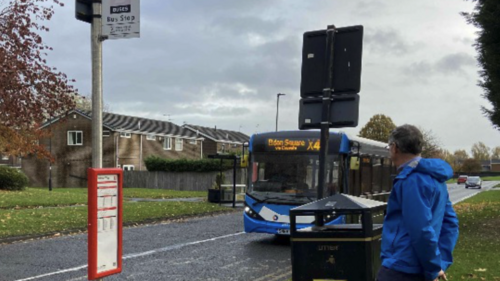 Gimme Shelter! John waiting on Windsor Way