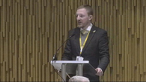 Councillor Colin Ferguson stood at podium in Newcastle City Council chamber