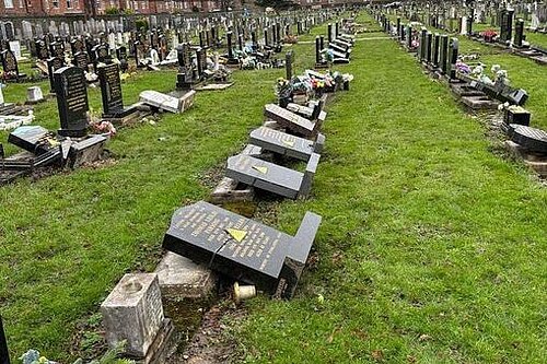 Gravestones laid on grass